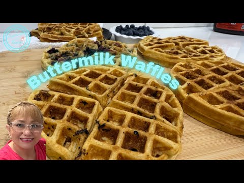 Belgium Buttermilk Waffles topped with warm syrup and blueberries