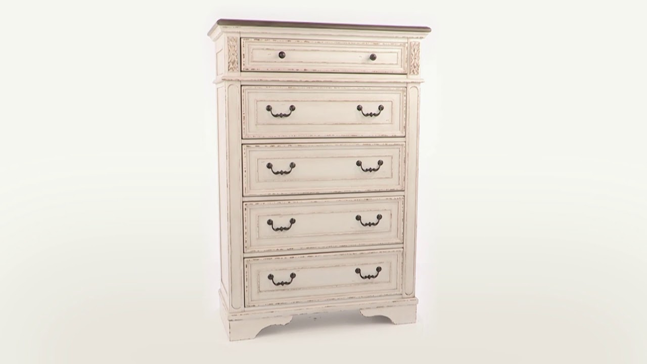 Realyn Chipped Two Tone Upholstered Panel Bedroom Set from Ashley