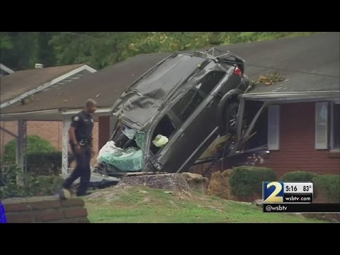 Teen ejected after shocking crash into home