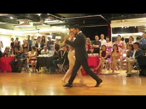  Sebastian Jimenez  and  Joana Gomes  are  dancing  to  a  tango