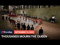 Thousands pass Queen Elizabeth's coffin as she lies in state in London