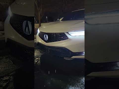 When does the 2023 Acura Integra Illuminated front A-Mark turn on?