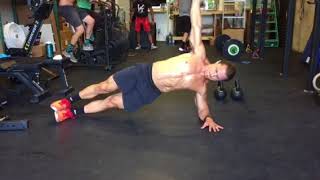 Dumbbell Side Plank Rotation exercise video thumbnail
