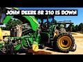 SPRAYING CORN AND PLANTING TRACTOR IS DOWN