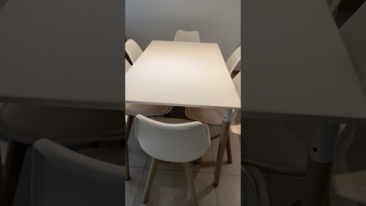 Mesa Eames + sillas Tulip