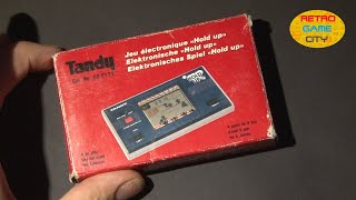 LCD Game | Tandy |  Hold up