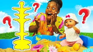 The Baby Born doll builds a toy garden! Pretend to play with toys & learn numbers with baby dolls.