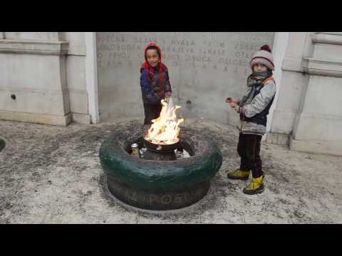 Roma Kids Causing Trouble by Eternal Flame in Sarajevo