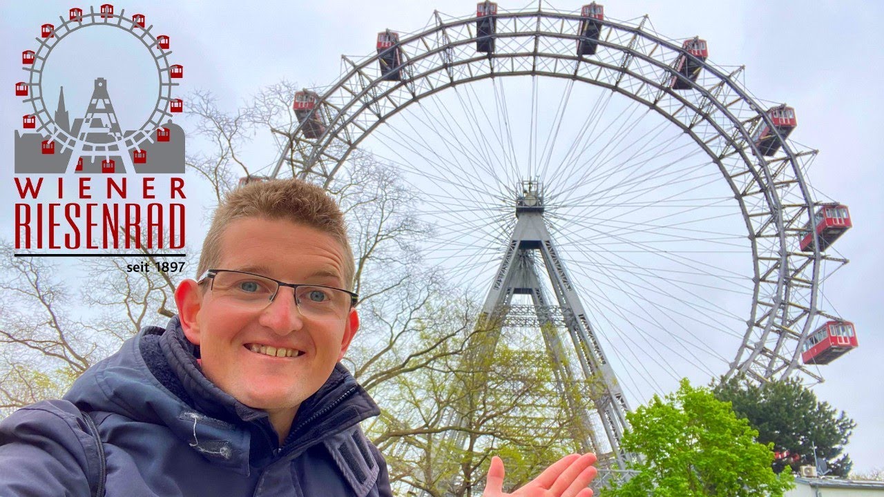 A traveler experiences Giant ferris wheel ride.