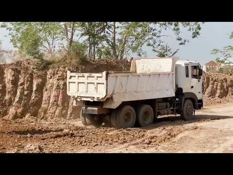 Machine operation White Cat 385C Excavator Loading Coal On 4 Axle Mercedes & MAN Trucks