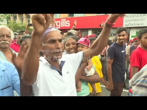 Thousands of opposition supporters gather near Colombo and demand restoration of law and order
