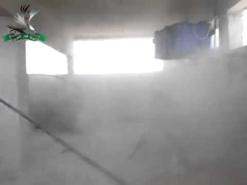 استهداف الأبنية التي تتمركز فيها عناصر النظام في معسكر وادي الضيف بقذيفة بي 9 من قبل ألوية فجر الحرية في ريف إدلب