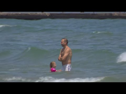 Flooding prompted Chicago River to be reversed, swimming at beaches to be banned
