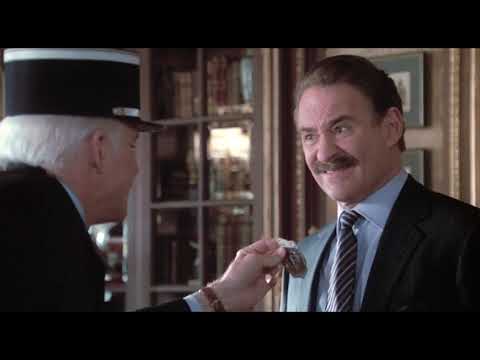 Official trailer still: Inspector Clouseau steps into the stadium tunnel as the Pink Panther caper theme tease begins