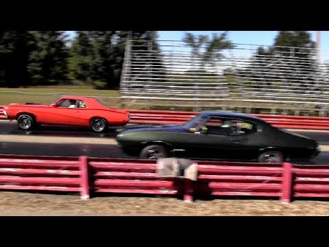 Ram Air IV GTO vs 428 Cobra Jet Cougar - 1/4 Mile Drag Race Video - Road Test TV ®