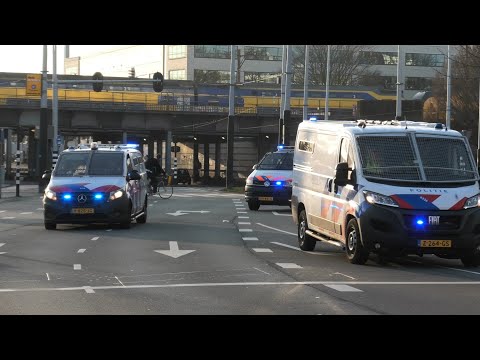 Belgische Waterwerper, Politie en veel ME met spoed onderweg over Wibautstraat in Amsterdam