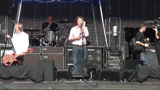 Paul McCartney - Yankee Stadium soundcheck - 7-15-11 ..Paul applies sunscreen for laughs