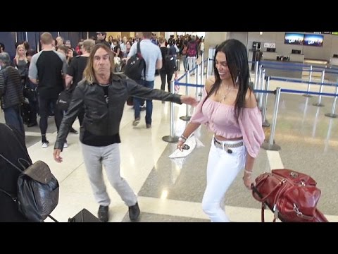 Iggy Pop And His Red Hot Wife Fly Out Of LAX