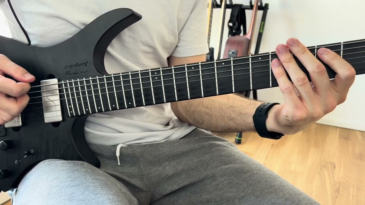 Roberto Barlocci playing the disorienting bridge riff from Haken's Pareidolia on guitar
