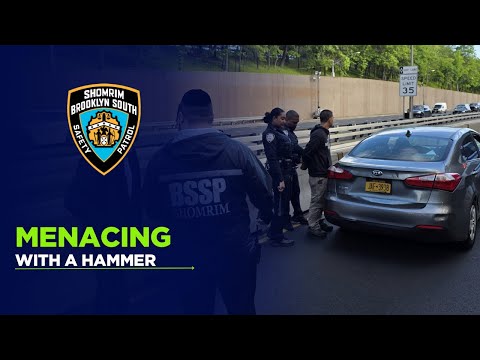 Menacing with a hammer