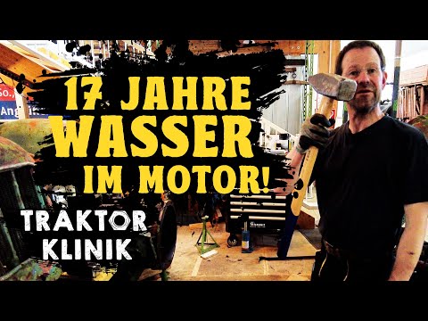 The tractor clinic: Holger battles the rust on his "waterlogged corpse"