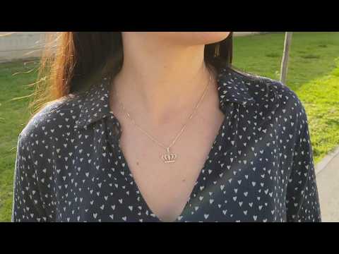 A video of Natural Diamond Crown Pendant in Solid Gold
