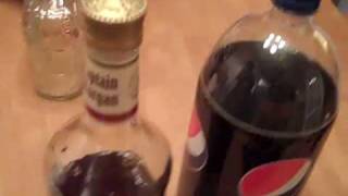 preview picture of video 'Why does a Crown Royal bottle cap fit on a Captain Morgan bo'