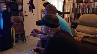 2 40 something year olds playing Mortal Kombat for the first time in over 15 years