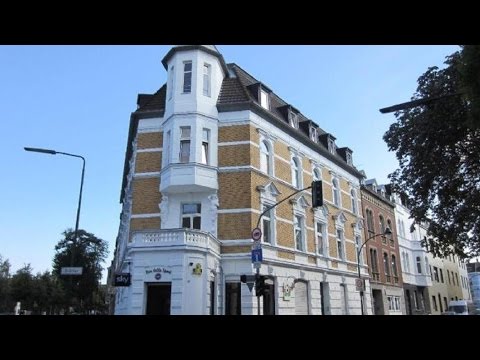 Altbau in repräsentativem Gewand! Gepflegte 2-Zimmer-Altbauwohnung mit Laminat und großer Terr