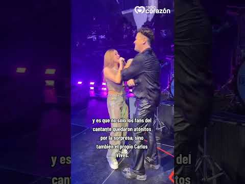 Shakira surprised Carlos Vives at her concert to sing "La Bicicleta" together.