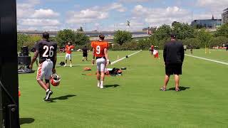 Joe Burrow fires passes with Will Grier and Jake Browning Wednesday at Bengals