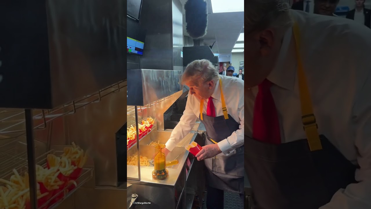 Donald Trump gets his hands dirty serving fries in McDonald's