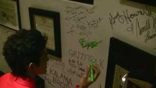 Bijan Taghavi Signs Wall of Pearl Street Studio - KX 93.5 FM Jazz Quest Radio