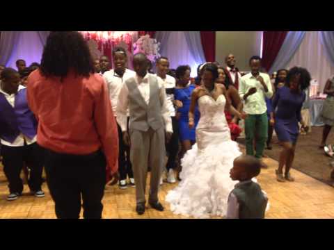 Mc Alemba on Dj Saints wedding 08/29/14. The dancing was real. Congrats to the Couple
