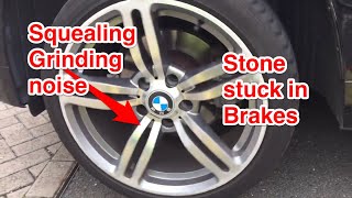 GRINDING SQUEALING FROM CAR BRAKES OR WHEELS, STONE STUCK BETWEEN BRAKE DISC AND BACKPLATE, REPAIR