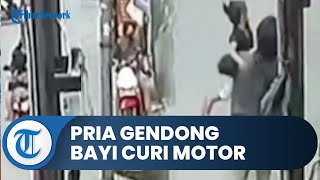 Seorang Pria Gendong Balita Curi Motor di Pinggir Jalan, Beraksi Siang Bolong dan Terekam CCTV