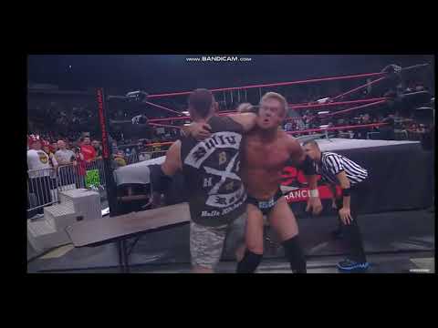 Mr Anderson sends Bully Ray through table