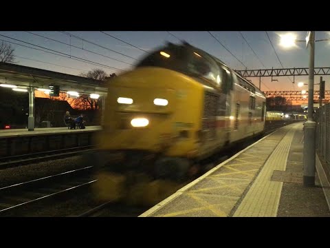 DRS 37419 zooms north past Colchester with 0Z18