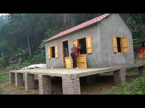 Single mother Lieu designed five wooden doors to ensure the safety of herself and her son.
