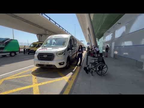 How to find courtesy bus stop at Malaga Airport