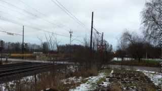 preview picture of video 'Green Cargo Göteborg bound freight train at a level crossing close to Åsen.'