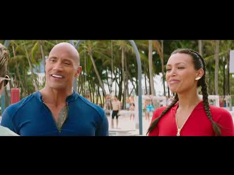 Nighttime yacht party infiltration from the trailer, lights glittering as a pop track flips the vibe from stakeout to set piece