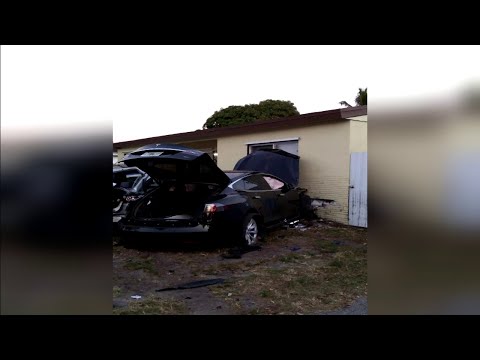 Tesla slams into Miramar home and several several parked in front
