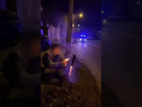 Men Setting Off Fireworks Illegally On Street Get Caught By Passing Police Vehicle