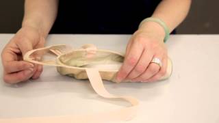 preview picture of video 'Premier School of Dance: How to do ribbons & elastics on pointe shoes'