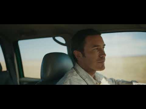 Tom Pelphrey,  in Outer Range - in the car