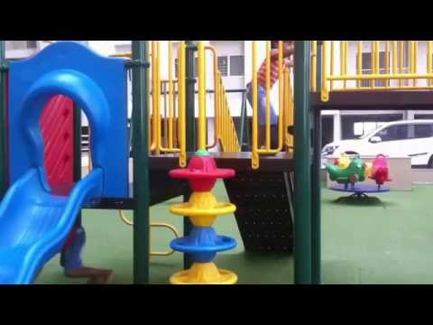 Children Playing In The Park With Roundabouts, Swing, Slide, SeeSaw #2 by JeannetChannel Video