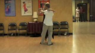 Video thumbnail for Argentine Tango teacher Colette Herbert and student demonstrating steps