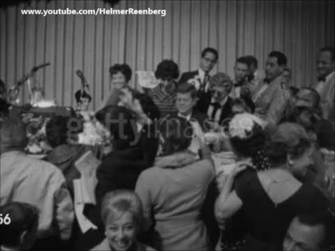November 2, 1960 - Senator John F. Kennedy besieged for autographs by women fans at breakfast.