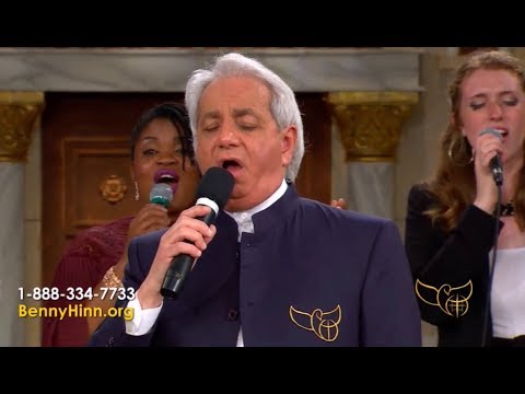 Benny Hinn sings "We Exalt Thee"